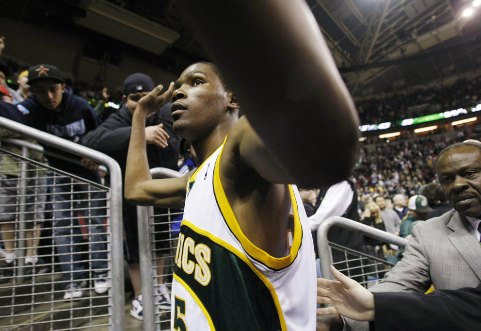 Seattle SuperSonics' Dallas Mavericks' during the quarter of their basketball game in Seattle, Sunday, April 13, 2008. (AP Photo/John Froschauer) Dallas Mavericks'  Seattle SuperSonics' during the quarter of their basketball game in Seattle, Sunday, April 13, 2008. (AP Photo/John Froschauer) 